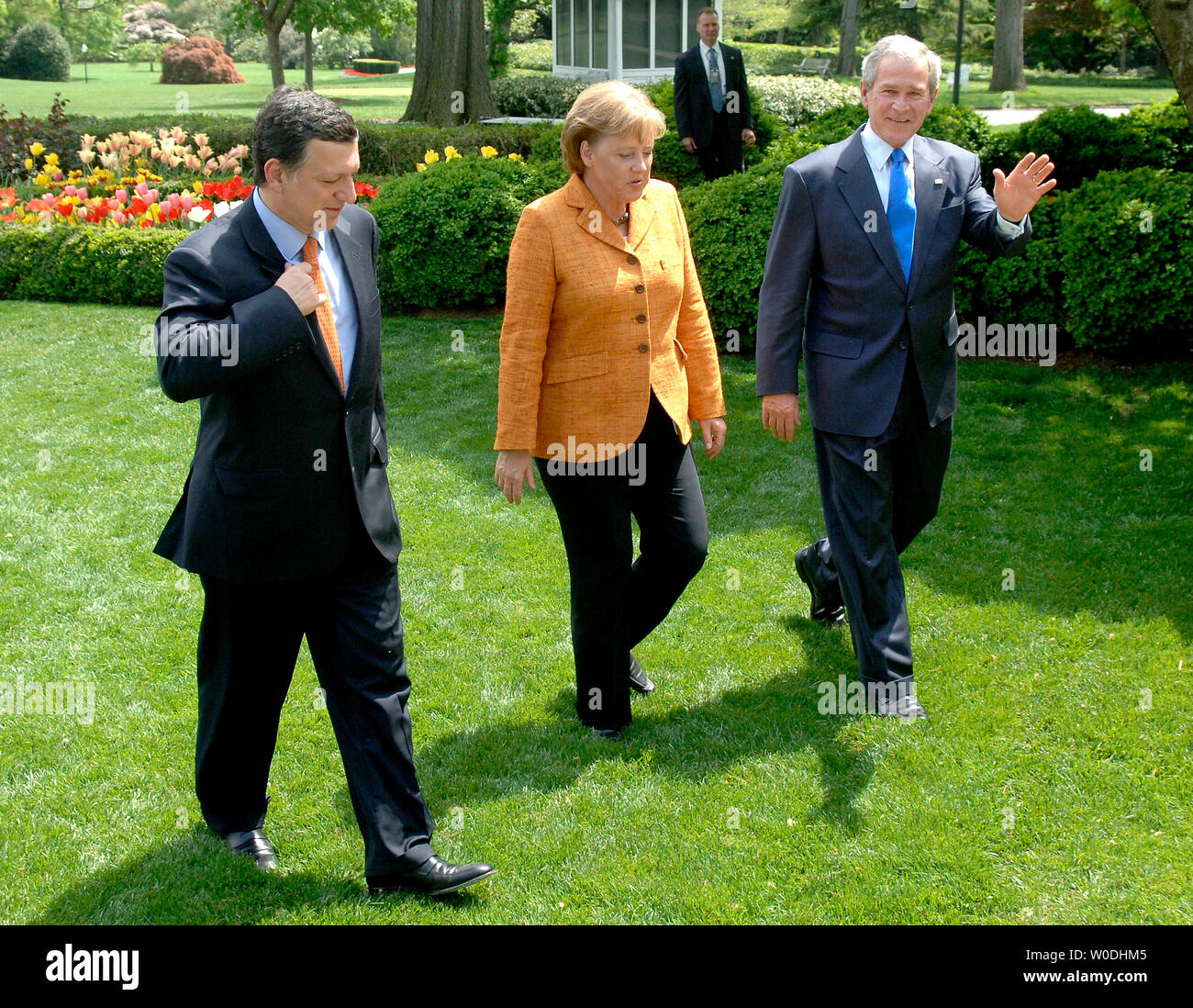 U.S. President George W. Bush (R) walks with the Chancellor of Germany and the President of the European Council Angela Merkel (C) and President of the European Commission Jose Manuel Barroso as they make their way to the Oval Office, following a joint press availability in the Rose Garden at The White House in Washington on April 30, 2007. (UPI Photo/Kevin Dietsch) Stock Photo