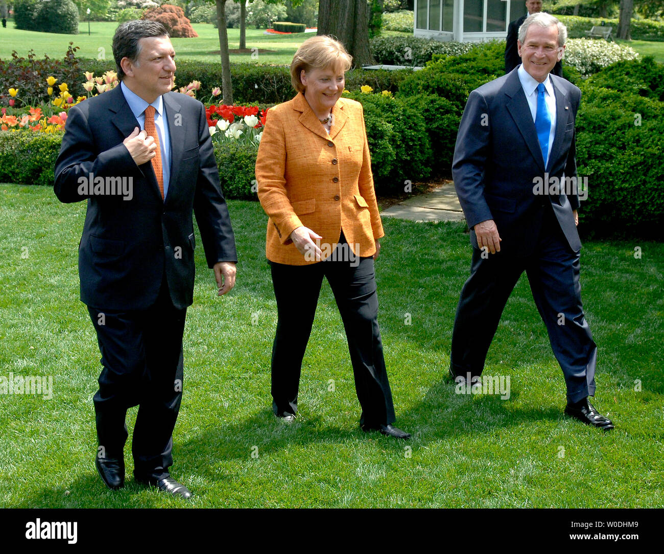 U.S. President George W. Bush (R) walks with the Chancellor of Germany and the President of the European Council Angela Merkel (C) and President of the European Commission Jose Manuel Barroso as they make their way to the Oval Office, following a joint press availability in the Rose Garden at The White House in Washington on April 30, 2007. (UPI Photo/Kevin Dietsch) Stock Photo