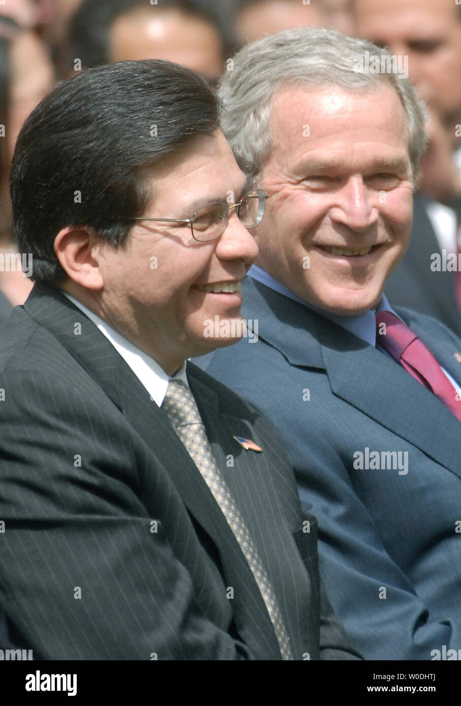 U.S. President George W. Bush (R) sits next to U.S. Attorney General Alberto Gonzales at a Cinco de Mayo celebration in the Rose Garden at The White House in Washington on May 4, 2007. (UPI Photo/Kevin Dietsch) Stock Photo
