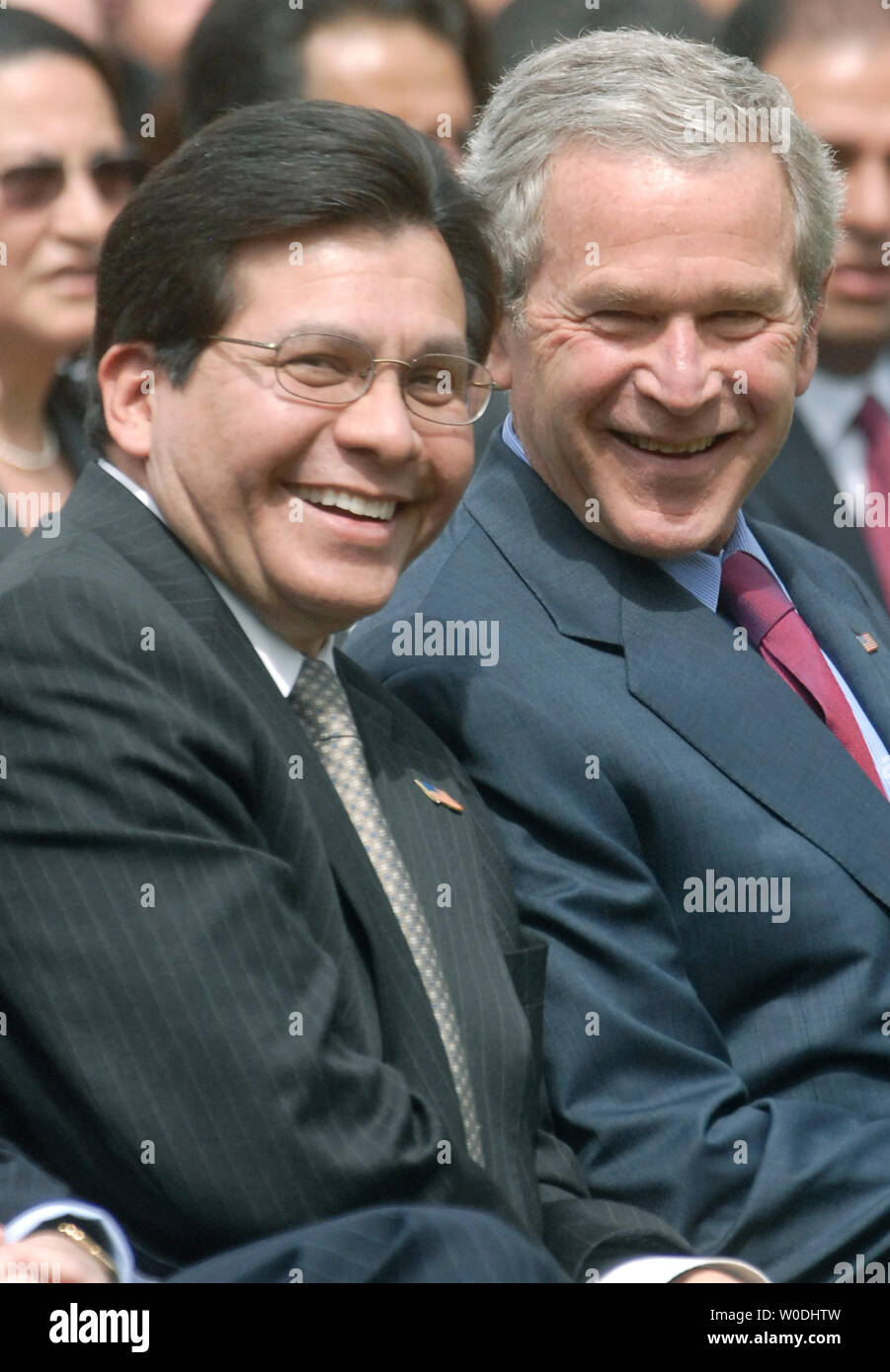 U.S. President George W. Bush (R) sits next to U.S. Attorney General Alberto Gonzales at a Cinco de Mayo celebration in the Rose Garden at The White House in Washington on May 4, 2007. (UPI Photo/Kevin Dietsch) Stock Photo