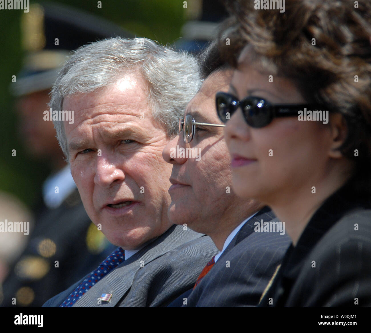 U.S. President George W. Bush, Attorney General Alberto Gonzales and Transportation Secretary Elaine Chao (L to R) attend the Annual Peace Officers' Memorial Service on the lawn of the U.S. Capitol in Washington on May 15, 2007.    (UPI Photo/Roger L. Wollenberg) Stock Photo