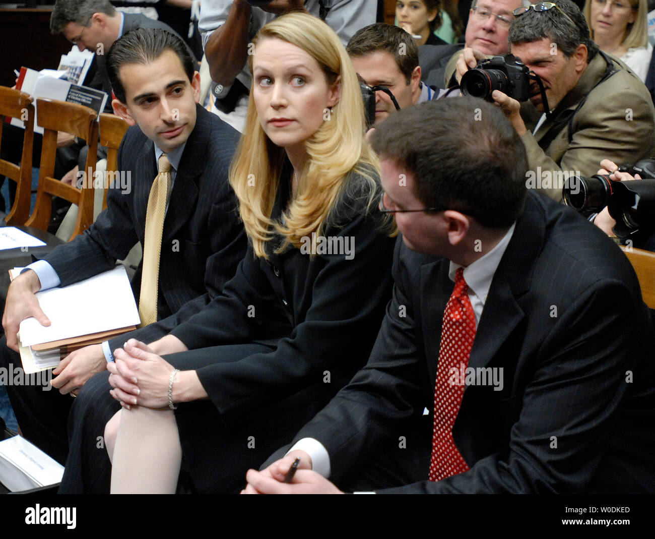Monica Goodling, former Justice Department White House Liaison, sits with members of her counsel prior to testifying before a House Judiciary Committee hearing on the firings of U.S. Attorneys, on Capitol Hill in Washington on May 23, 2007. (UPI Photo/Kevin Dietsch) Stock Photo