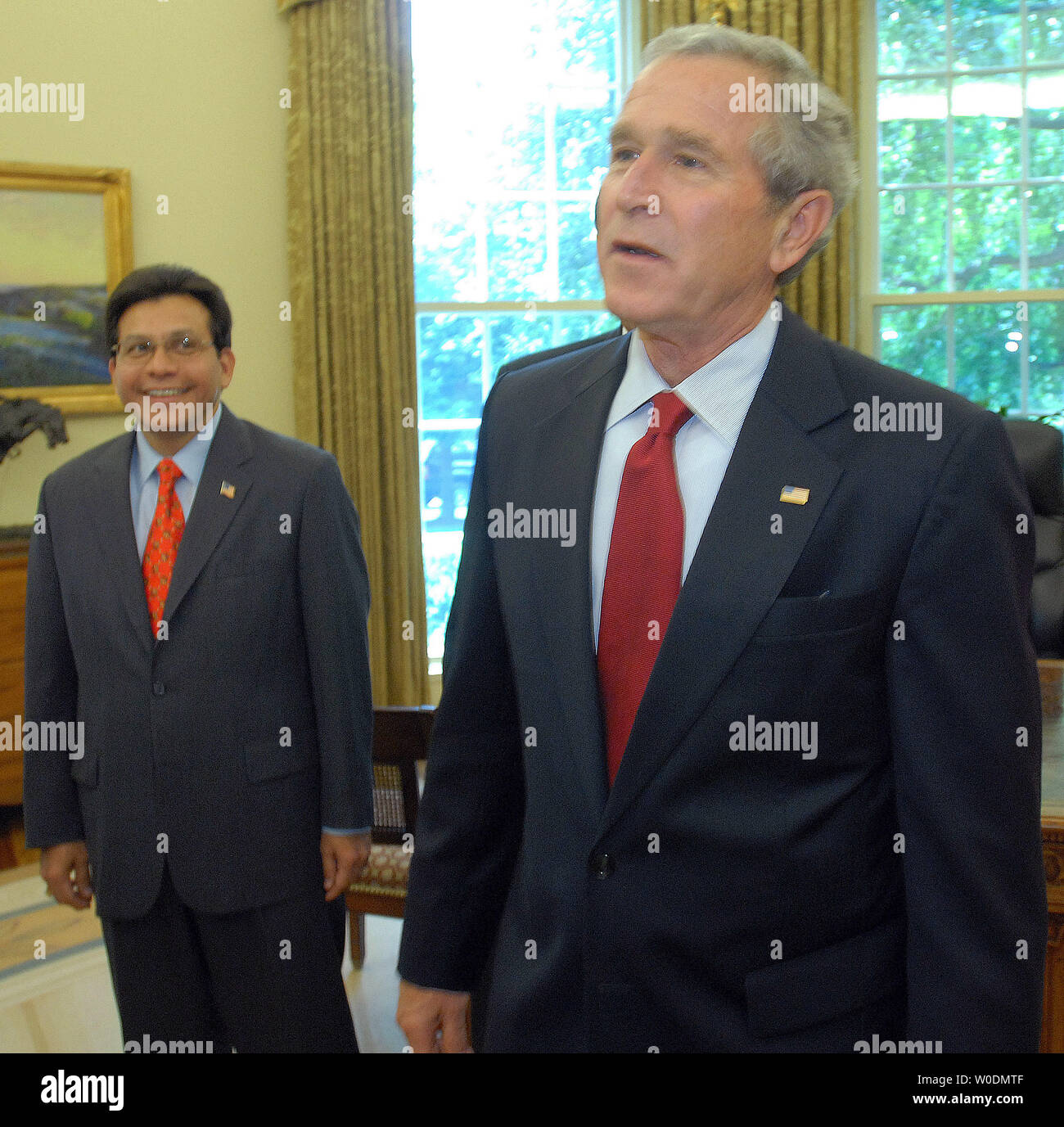 U.S. President George W. Bush (R) and Attorney General Alberto Gonzales met in the Oval Office of the White House to discuss the 'Report to the President on Issues Raised by the Virginia Tech Tragedy' in Washington on June 13, 2007.   (UPI Photo/Roger L. Wollenberg) Stock Photo