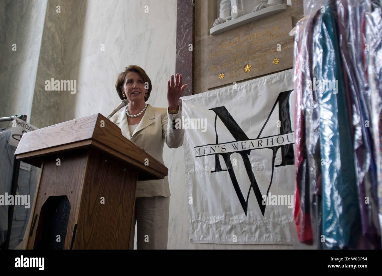 Speaker of the House Nancy Pelosi (D-CA) speaks at the 'Capitol PurSuit' event on Capitol Hill in Washington on June 27, 2007. Lobbyists and members of Congress donated suits and dress clothes to families in need. (UPI Photo/Dominic Bracco II) Stock Photo