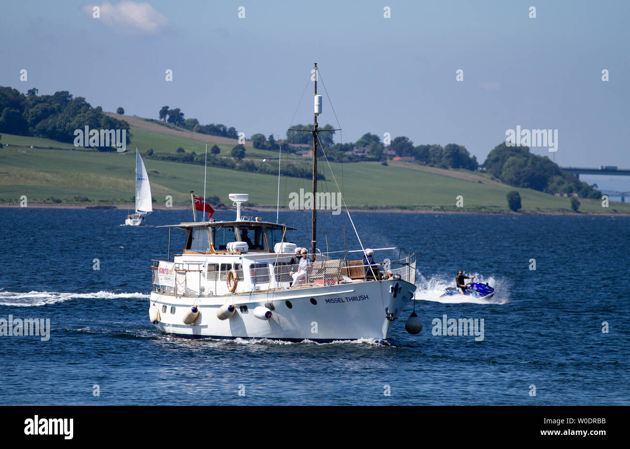 Dundee, Tayside, Scotland, UK. 27th June, 2019. UK weather: Sunny day with a very cool easterly breeze across Tayside. The River Tay leisure boat and Stock Photo