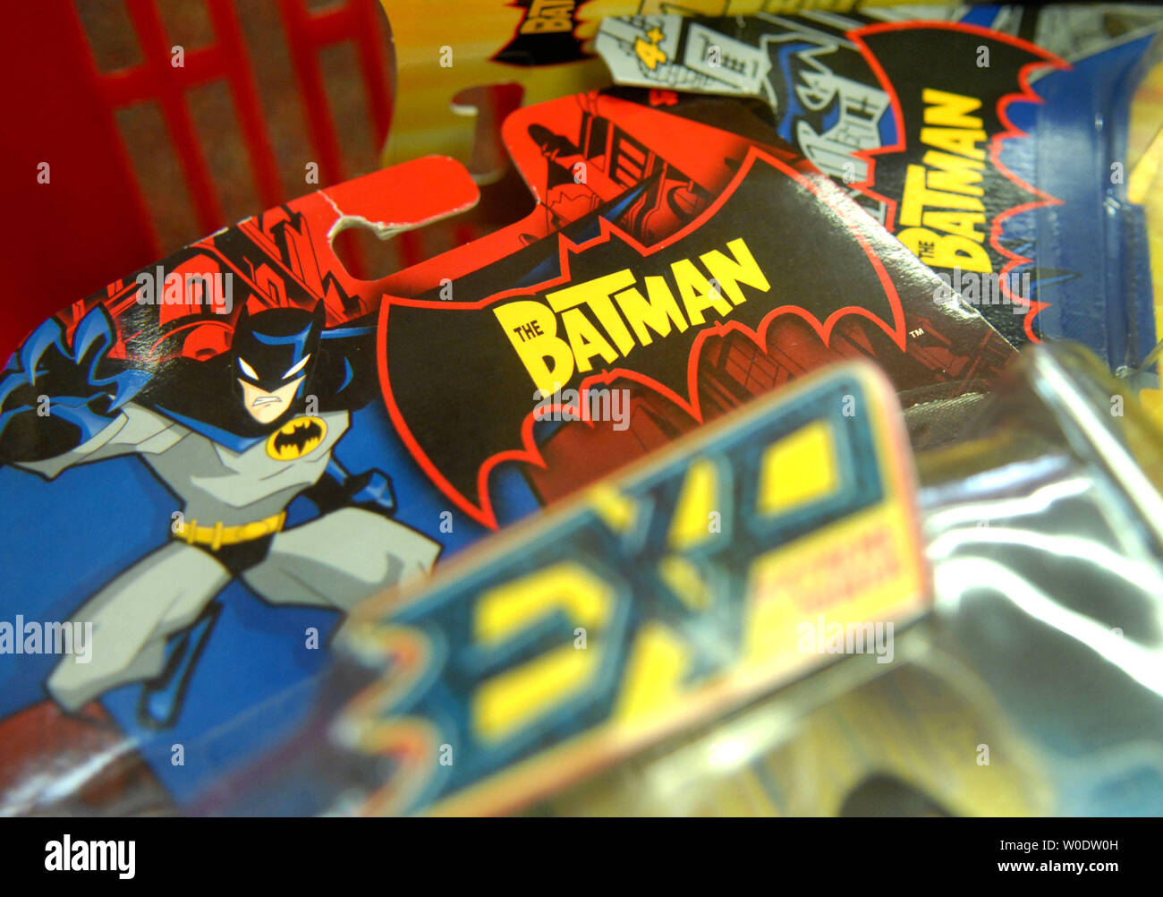 Batman action figures are seen in a basket at Kinder Haus Toy store in Arlington, Virginia on August 14, 2007. Mattel recalled 9 million Chinese made toys, including Polly Pocket play sets, Batman action figures, Fisher-Price toys and some die cast cars because of the presence of lead paint or their use of tiny magnets that could cause a choking hazard. This comes after Cheung Shu-hung, co-owner of A Lee Der Chinese Toy manufacturers, committed suicide at a warehouse following a Chinese ban. (UPI Photo/Kevin Dietsch) Stock Photo