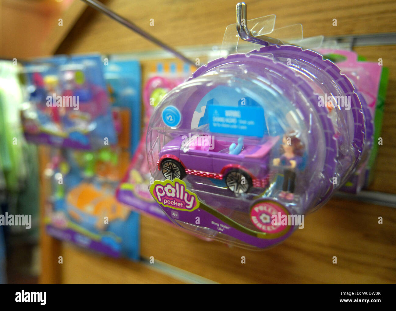 Polly Pocket toys are seen on display at Kinder Haus Toy store in Arlington, Virginia on August 14, 2007. Mattel recalled 9 million Chinese made toys, including Polly Pocket play sets, Batman action figures, Fisher-Price toys and some die cast cars because of the presence of lead paint or their use of tiny magnets that could cause a choking hazard. This comes after Cheung Shu-hung, co-owner of A Lee Der Chinese Toy manufacturers, committed suicide at a warehouse following a Chinese ban. (UPI Photo/Kevin Dietsch) Stock Photo