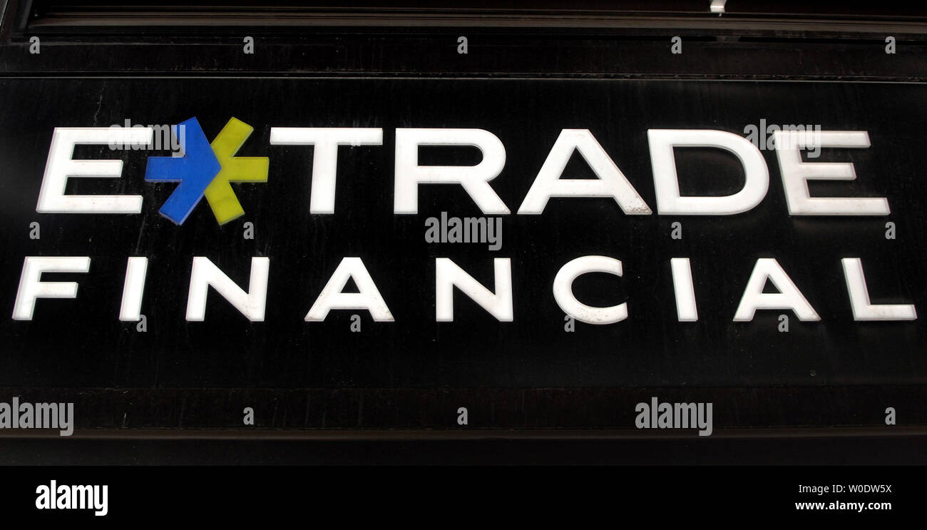 The E-Trade Financial sign is seen on their branch in Washington on August  22, 2007. Shares of E-Trade Financial Corp rose after a report said the  online broker has been discussing a