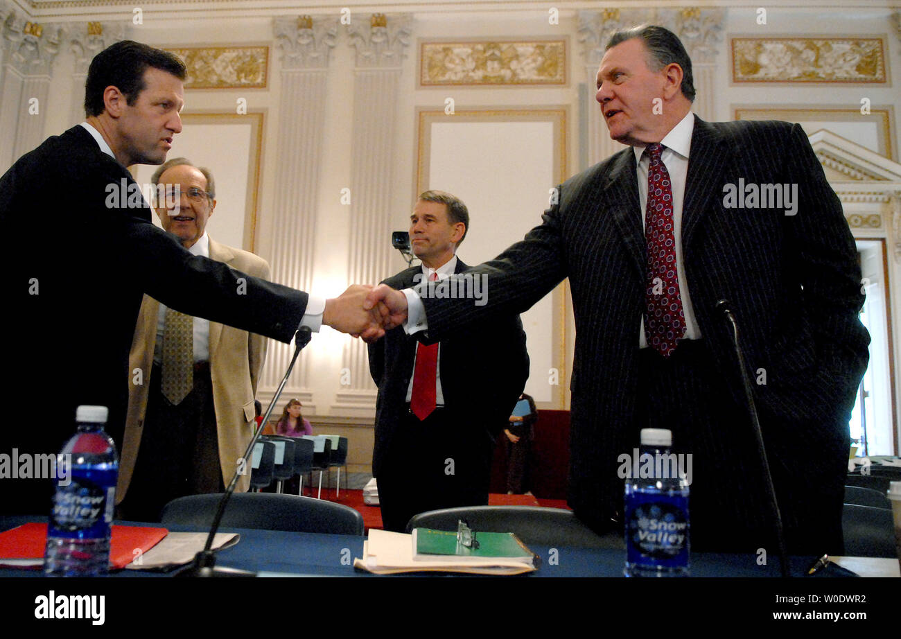 Rep. Bruce Braley (R-IA) greets Retired Army Gen. John Keane (R) while Retired Army Major John Batise (C) and former U.S. Secretary of Defense William J. Perry watch on prior to a House Armed Services and Foreign Affairs joint Committee hearing entitled 'Whats Next for Iraq' in Washington on September 6, 2007. (UPI Photo/Kevin Dietsch) Stock Photo