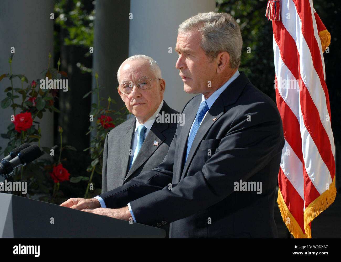 U.S. President George W. Bush (R) announces Michael B. Mukasey, a retired federal judge from New York, to replace Alberto Gonzales as attorney general in the Rose Garden of the White House on September 17, 2007.   (UPI Photo/Roger L. Wollenberg) Stock Photo