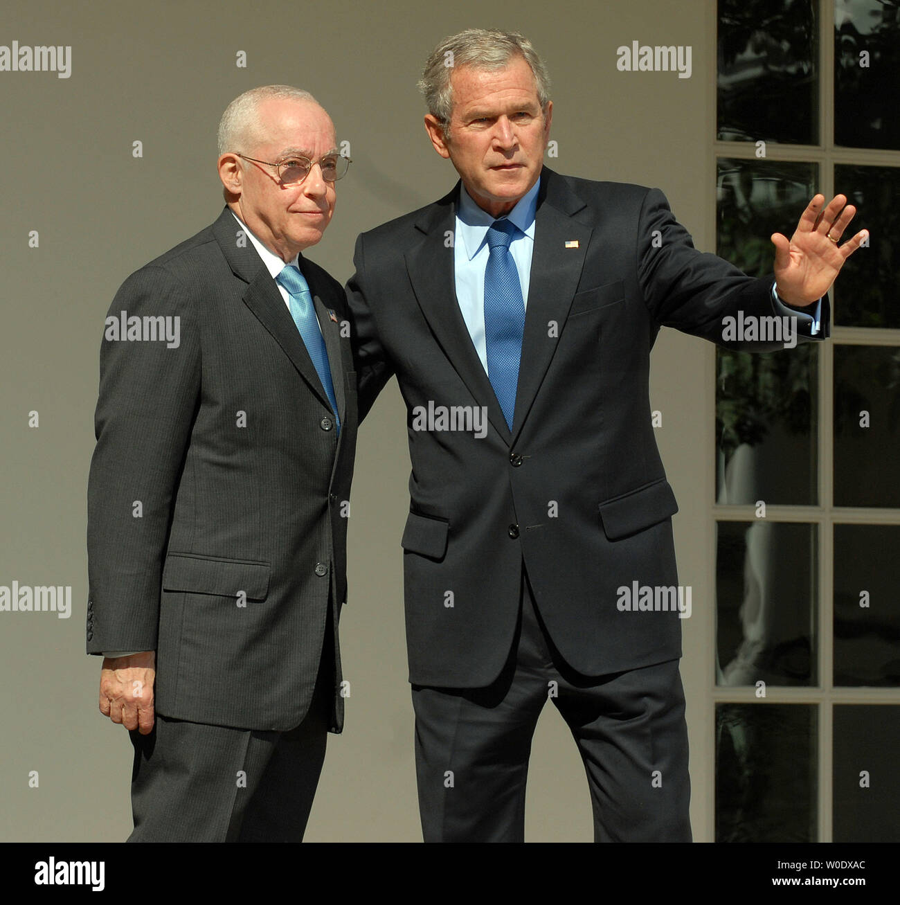Michael B. Mukasey, a retired federal judge from New York, (L) and U.S. President George W. Bush depart after Bush announced his nomination of Mukasey to replace Alberto Gonzales as attorney general in the Rose Garden of the White House on September 17, 2007.   (UPI Photo/Roger L. Wollenberg) Stock Photo