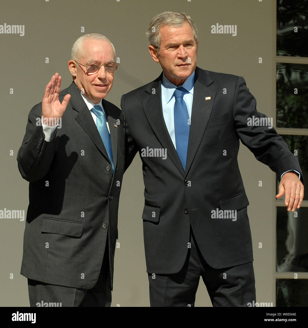 Michael B. Mukasey, a retired federal judge from New York, (L) and U.S. President George W. Bush depart after Bush announced his nomination of Mukasey to replace Alberto Gonzales as attorney general in the Rose Garden of the White House on September 17, 2007.   (UPI Photo/Roger L. Wollenberg) Stock Photo