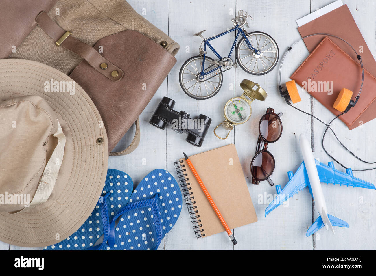 Prepare for journey accessories and travel items, packing clothes in