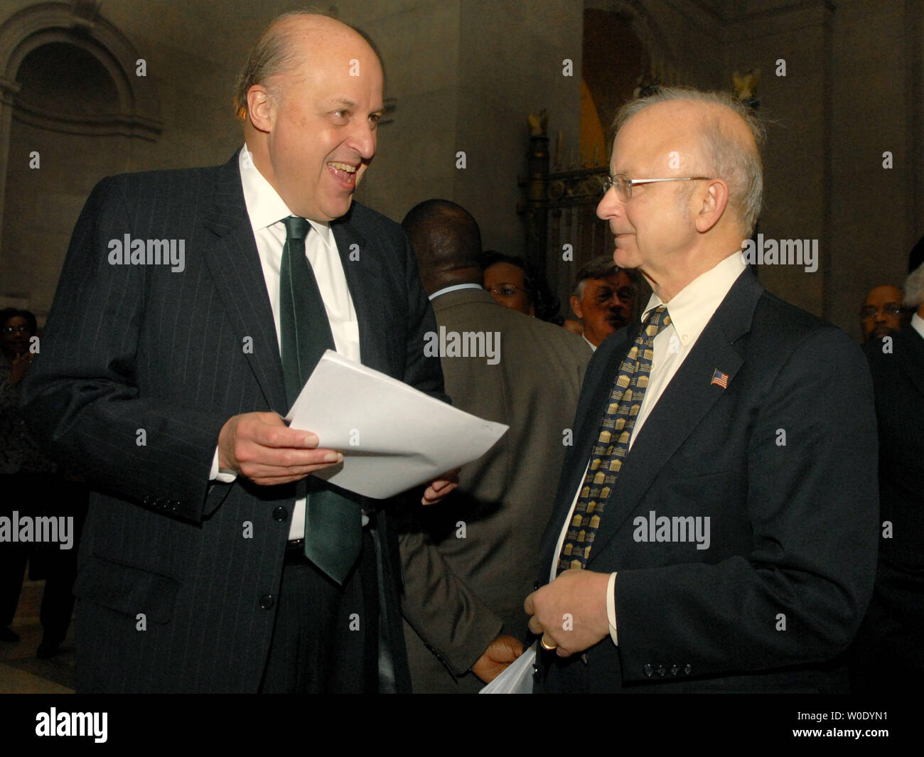 Deputy Secretary of State Negroponte (L) and Archivist of the United States Allen Weinstein attend a diplomatic reception at the National Archives to welcome Nancy Brinker as the newly appointed Chief of Protocol, in Washington on October 11, 2007. (UPI Photo/Kevin Dietsch) Stock Photo