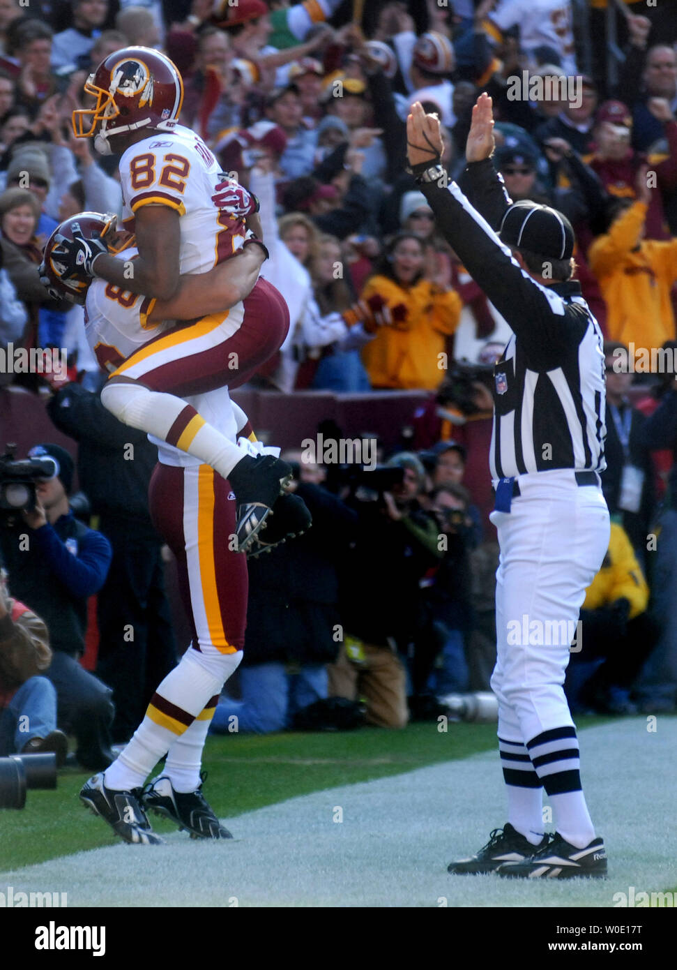 Washington Redskins James Thrash celebrates his 12-yard touchdown reception with teammate Antwaan Randle El (82) against the Philadelphia Eagles during the second quarter at FedEx Field in Landover, Maryland on November 11, 2007. (UPI Photo/Kevin Dietsch) Stock Photo