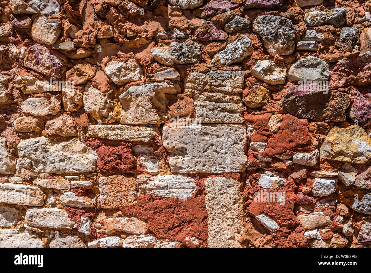 France, Vaucluse, stonework on a wall of Roussillon (Plus Beaux Villages de France - Most Beautiful Villages of France) Stock Photo