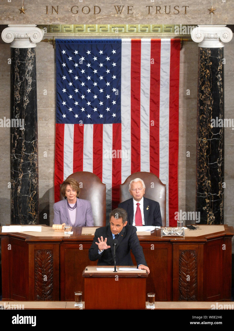 French President Nicolas Sarkozy addresses a joint meeting of Congress at the Capitol Building in Washington on November 7, 2007. House Majority Leader Nancy Pelosi and Senate President Pro Tempore Sen. Robert Byrd (D-WV) watched on. (UPI Photo/Kevin Dietsch) Stock Photo