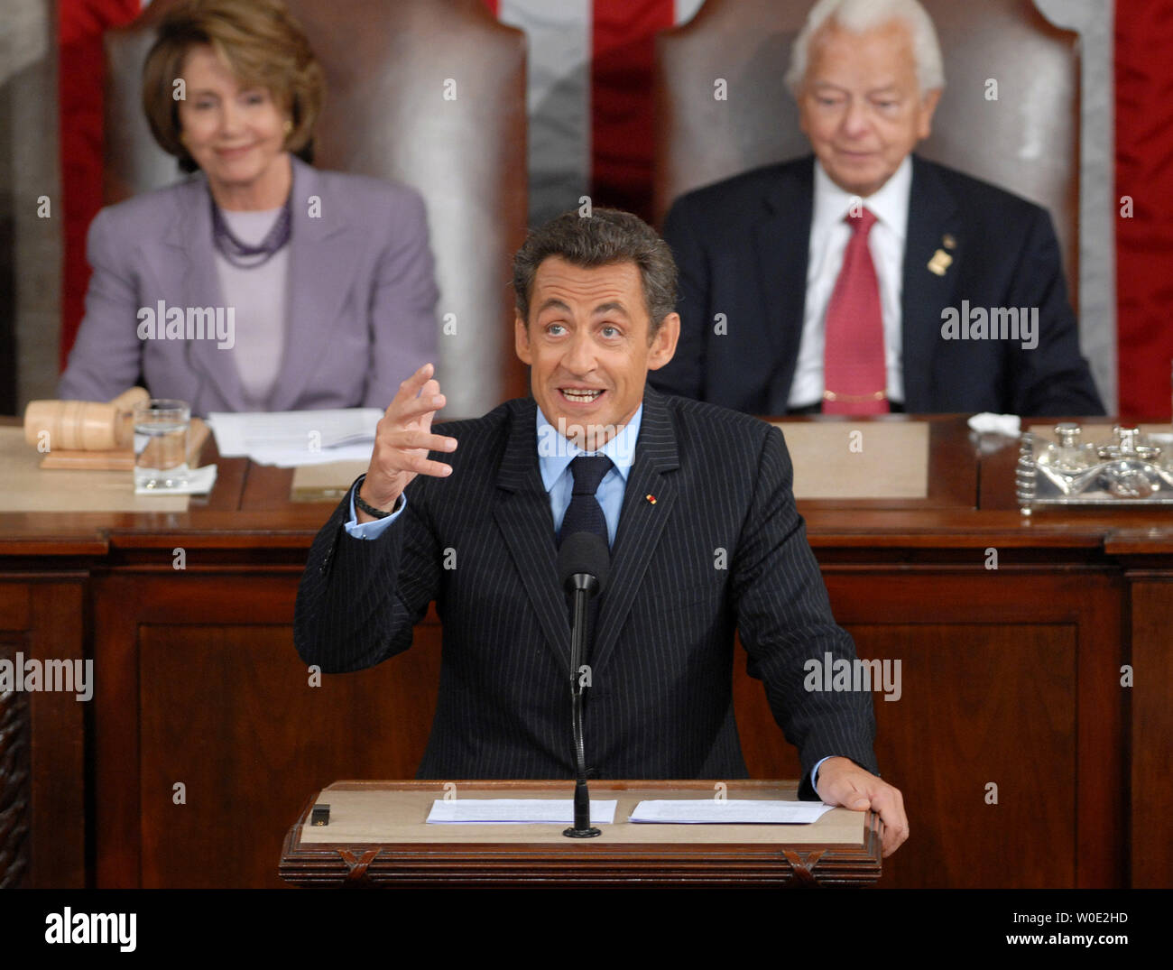French President Nicolas Sarkozy addresses a joint meeting of Congress at the Capitol Building in Washington on November 7, 2007. Speaker of the House Nancy Pelosi and Senate President Pro Tempore Robert Byrd (D-WV) watched on. (UPI Photo/Kevin Dietsch) Stock Photo