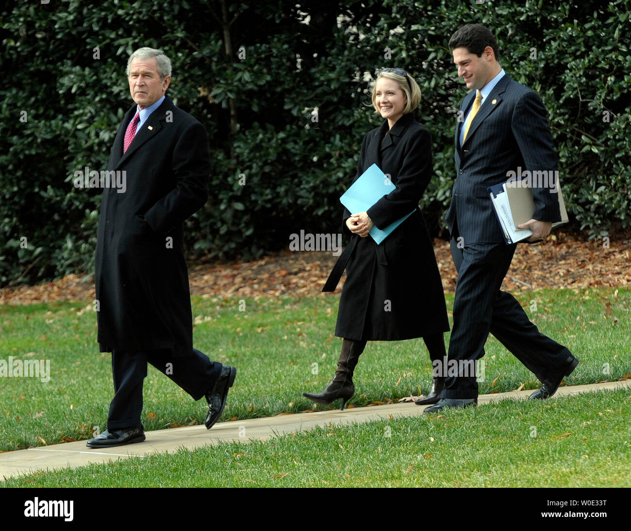 U.S. President George W. Bush departs from the South Lawn of the White House in Washington, en route to Fredericksburg, Virginia, to discuss the economy, on December 17, 2007. With Bush are White House Press Secretary Dana Perino and White House Deputy Chief of Staff for Policy Joel D. Kaplan.    (UPI Photo/Roger L. Wollenberg) Stock Photo