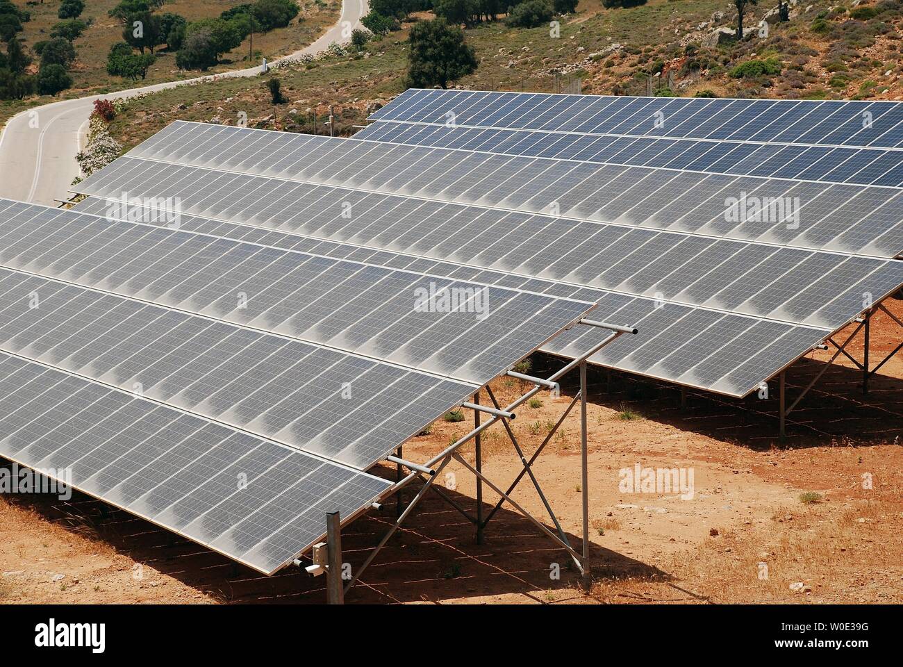 A bank of solar energy panels on the Greek island of Tilos. The island aims to be self sufficient in power through solar and wind energy. Stock Photo