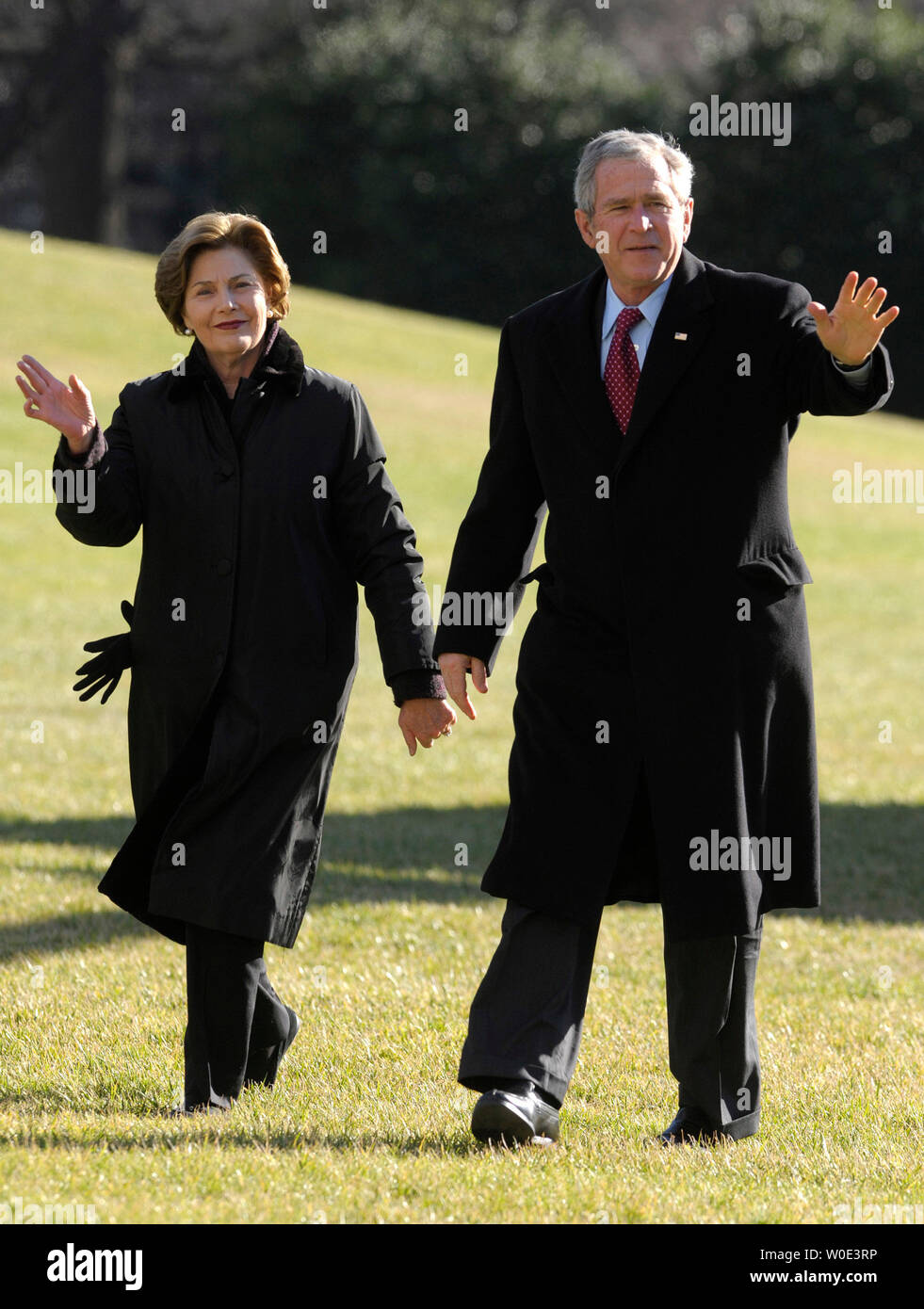 President George W. Bush and First Lady Laura Bush return to the White House in Washington after spending the holidays at Camp David and the Bush ranch in Crawford, Texas on January 1, 2008. (UPI Photo/Kevin Dietsch) Stock Photo