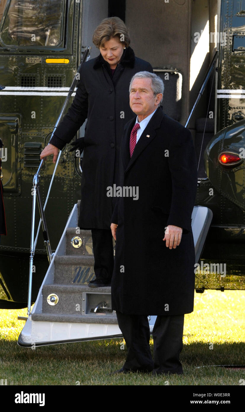 President George W. Bush and First Lady Laura Bush return to the White House in Washington after spending the holidays at Camp David and the Bush ranch in Crawford, Texas on January 1, 2008. (UPI Photo/Kevin Dietsch) Stock Photo