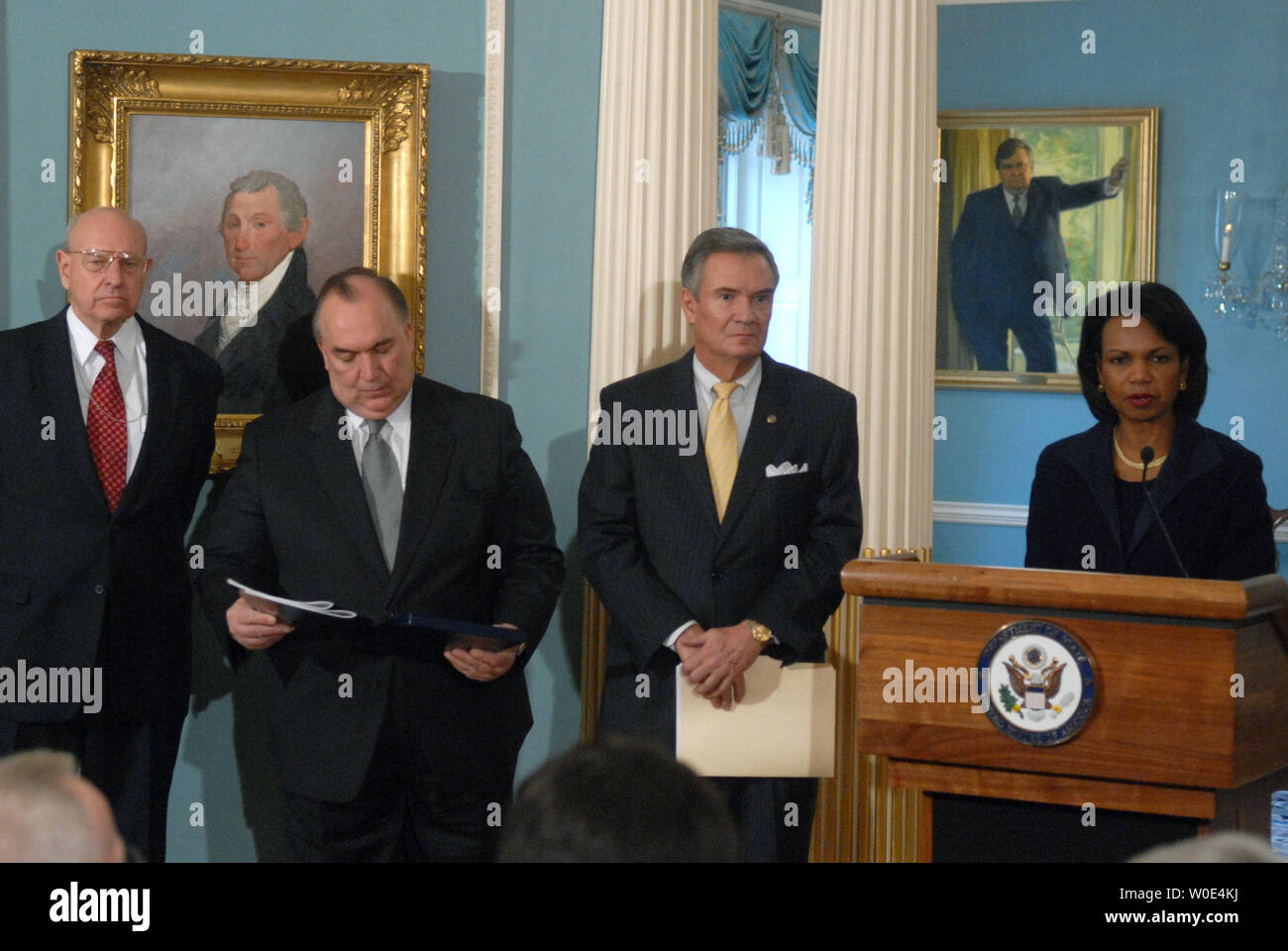 U.S. Secretary of State Condoleezza Rice  (R) speaks alongside members of the Advisory Committee on Transformational Diplomacy including co-chairmen John Breaux (2nd-R) and John Engler (2nd-L) and member Thomas Pickering after the advisory delivered their final report at the State Department in Washington on January 29, 2008. The advisory was formed to help transition the State Department's diplomatic practices into the 21st century.  (UPI Photo/Kevin Dietsch) Stock Photo
