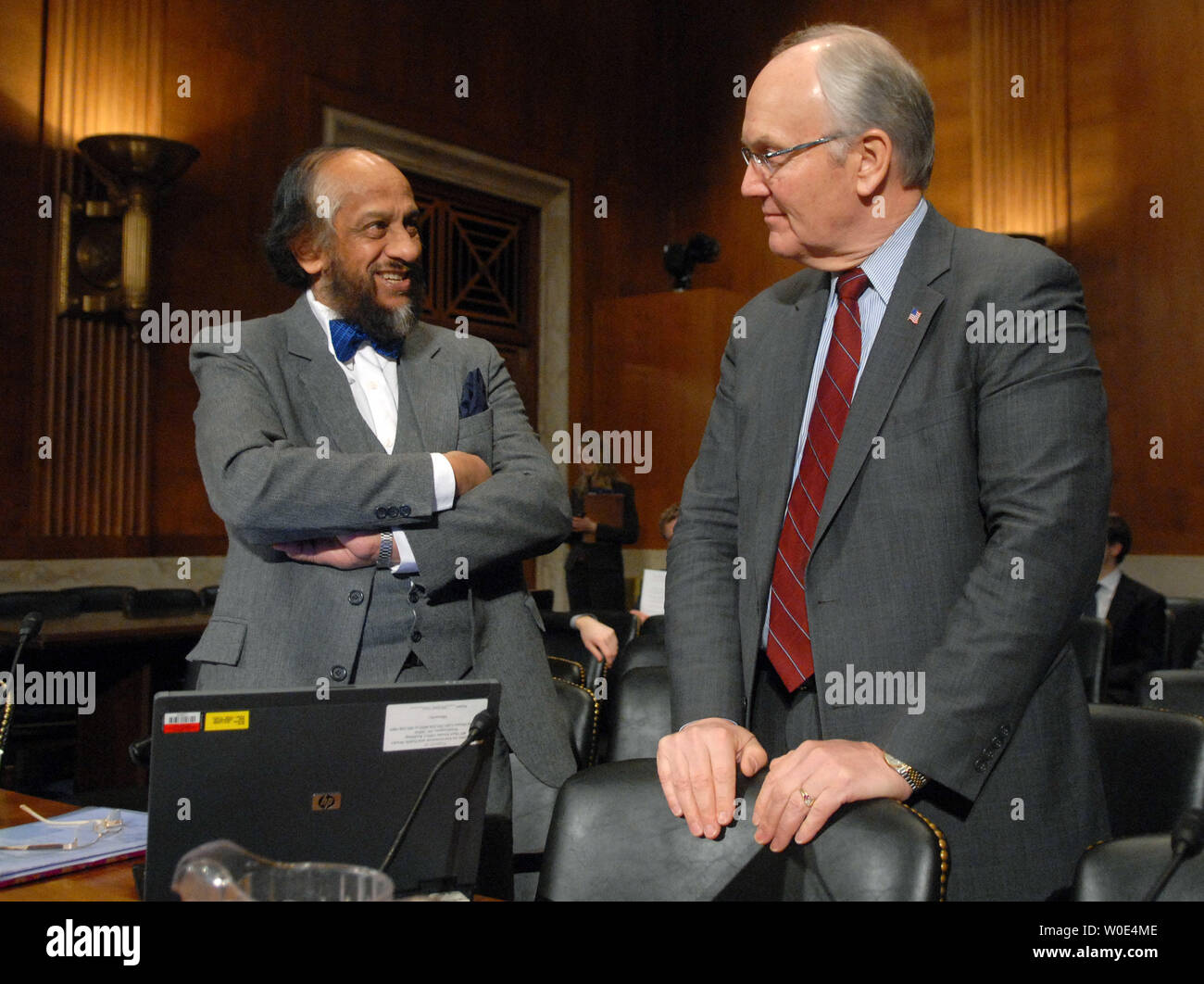 Rajenda Pachauri (L), chairman of the United Nation's Intergovernmental Panel on Climate Change, talks to Sen. Larry Craig (R-ID) prior to a Senate Environment and Public Works Committee hearing on global warming in Washington on January 30, 2008. (UPI Photo/Kevin Dietsch) Stock Photo