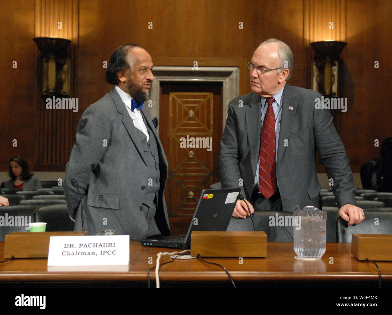 Rajenda Pachauri (L), chairman of the United Nation's Intergovernmental Panel on Climate Change, talks to Sen. Larry Craig (R-ID) prior to a Senate Environment and Public Works Committee hearing on global warming in Washington on January 30, 2008. (UPI Photo/Kevin Dietsch) Stock Photo