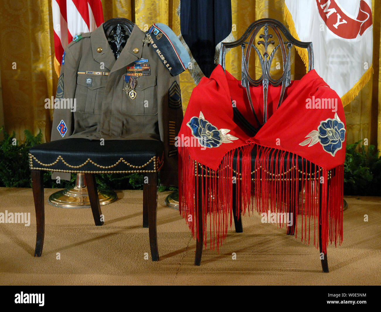 Chairs bearing the uniform of Korean War veteran Master Sgt. Woodrow