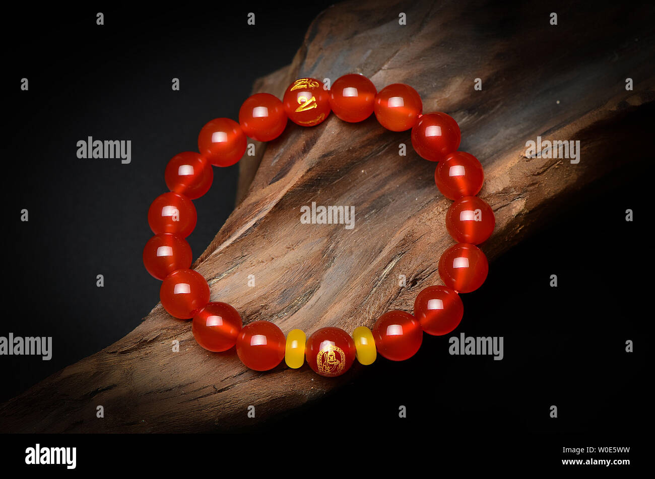 Red crystal agate, eight patron guardians bracelets. Stock Photo