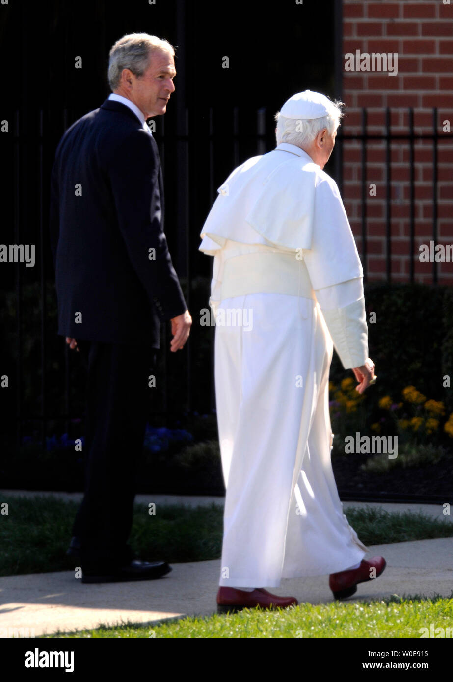 U.S. President George W. Bush walks with Pope Benedict XVI after the Pope arrived on his first visit to the United States at Andrew Air Force base outside of Washington on April 15, 2008. (UPI Photo/Kevin Dietsch) Stock Photo