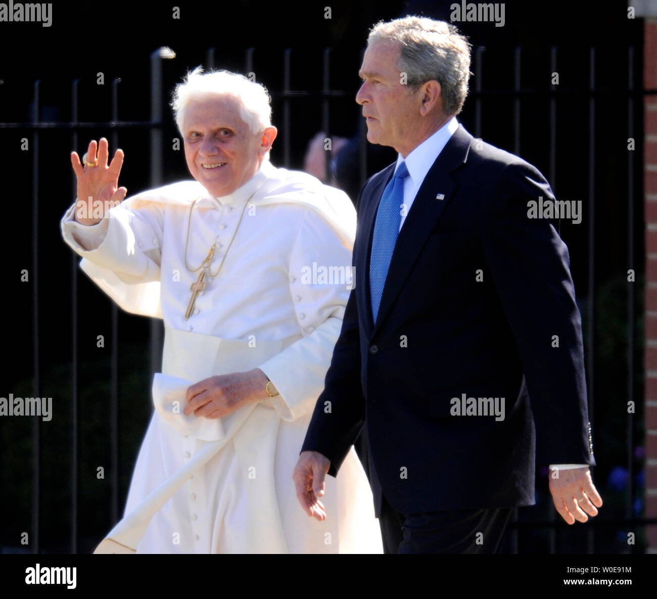 U.S. President George W. Bush walks with Pope Benedict XVI after the Pope arrived on his first visit to the United States at Andrew Air Force base outside of Washington on April 15, 2008. (UPI Photo/Kevin Dietsch) Stock Photo