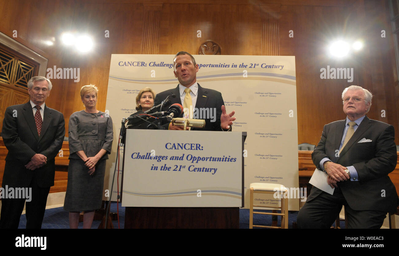Lance Armstrong, Tour de France winner, cancer survivor, and founder and chairman of the Lance Armstrong Foundation, speaks during a news conference following the Senate Health, Education, Labor and Pensions Committee's hearing on cancer challenges and opportunities on Capitol Hill in Washington on May 8, 2008. From left are Edward Benz, president of the Dana Farber Cancer Institute, Hala Moddelmog, CEO of the Susan G. Komen Foundation, Sen. Kay Bailey Hutchison, R-TX, Armstrong, and Sen. Edward Kennedy, D-MA.    (UPI Photo/Roger L. Wollenberg) Stock Photo