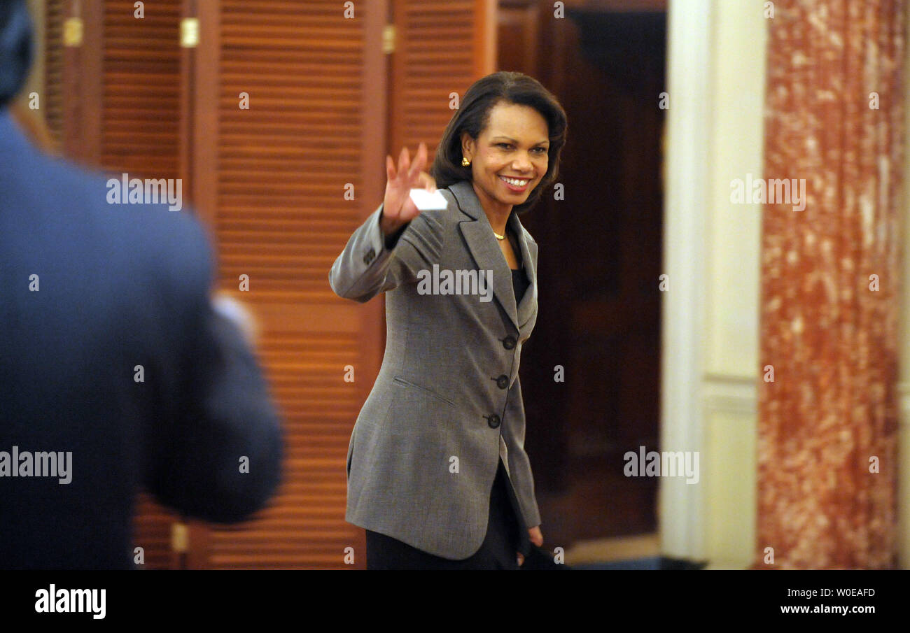 Secretary of State Condoleezza Rice waves as she departs after a ...