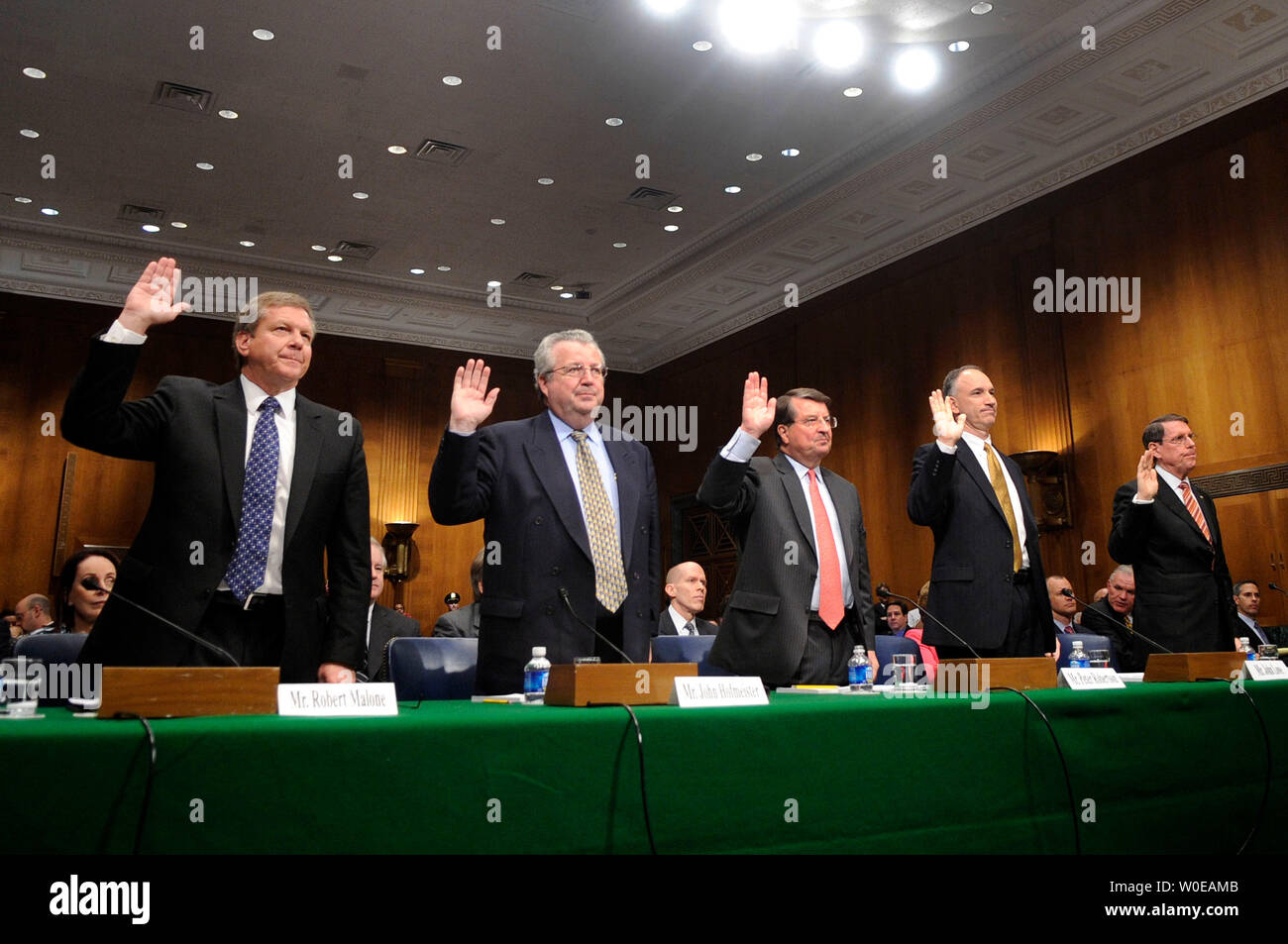 From left to right, Robert Malone, chairman and president of BP America Inc., John Hofmeister, president of Shell Oil Company, Peter Robertson, vice chairman of the Chevron Corporation, John Lowe, executive vice president of ConocoPhillips, and Stephen Simon, senior vice president of the Exxon Mobil Corporation,  are sworn in prior to a Judiciary Committee hearing on the rising price of oil in Washington on May 21, 2008. (UPI Photo/Kevin Dietsch) Stock Photo