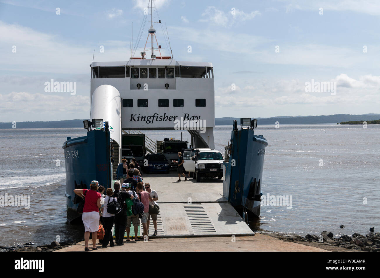 Foot passengers boarding the Kingfisher Bay car ferry at River Heads south of Hervey Bay for Fraser Island in Queensland, Australia. Stock Photo