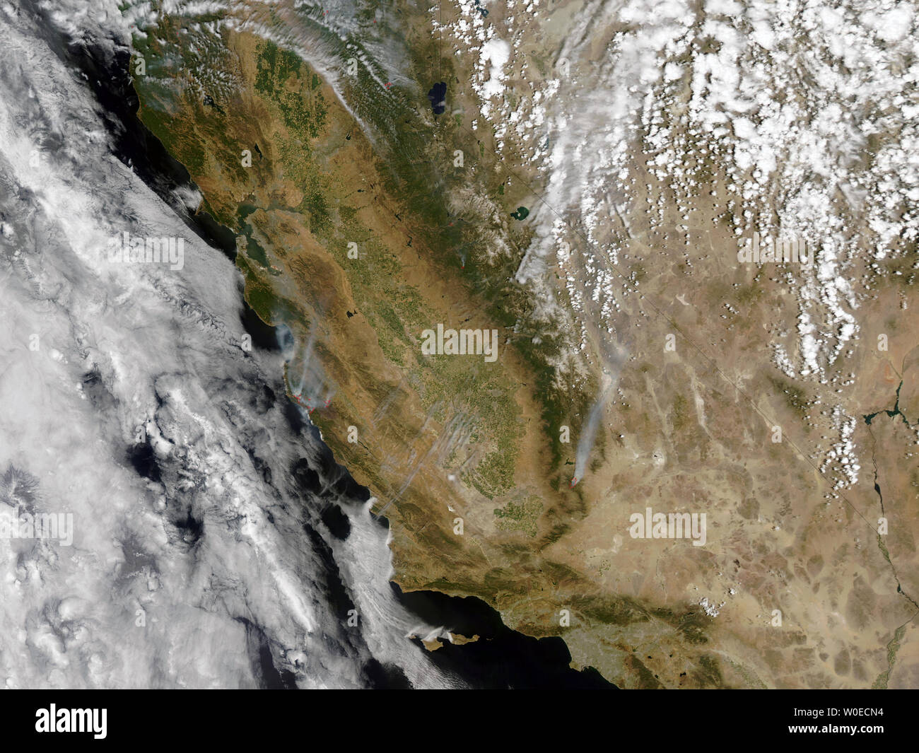 NASA’s Aqua satellite captured this image of several fires as it passed over California on June 30, 2008. Numerous wildfires continue to burn out of control throughout California. Many of these fires were ignited in late June by dry lighting and made worse by parched conditions and a lack of rainfall, fire officials report. About 364,600 acres, or almost 570 square miles, of land throughout the state have already burned, and most of the blazes have not yet been contained. (UPI Photo/NASA) Stock Photo