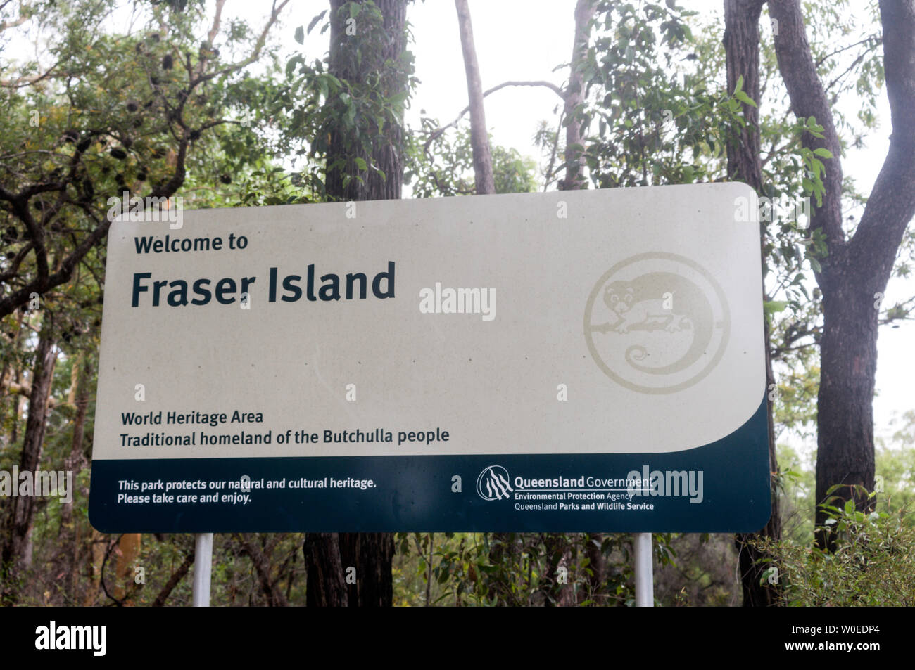 A visitors road sign on Fraser Island off the coast of Queensland in Australia.  Fraser Island is a World Heritage site and is the world's biggest san Stock Photo