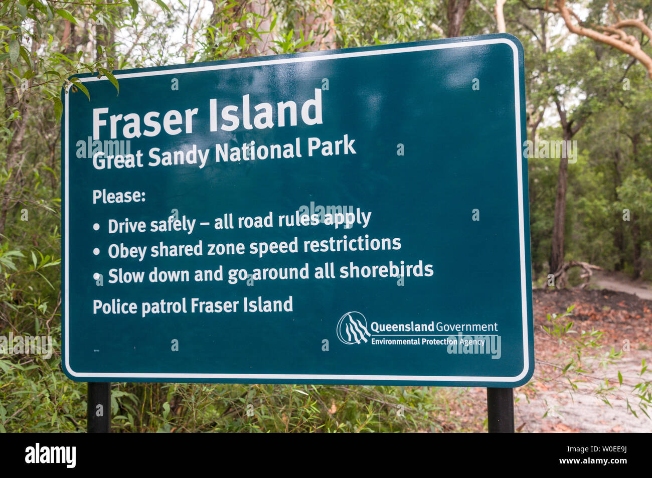 A road sign at Great Sandy National Park on on Fraser Island in Queensland, Australia  Fraser Island is a World Heritage site and is the world's bigge Stock Photo