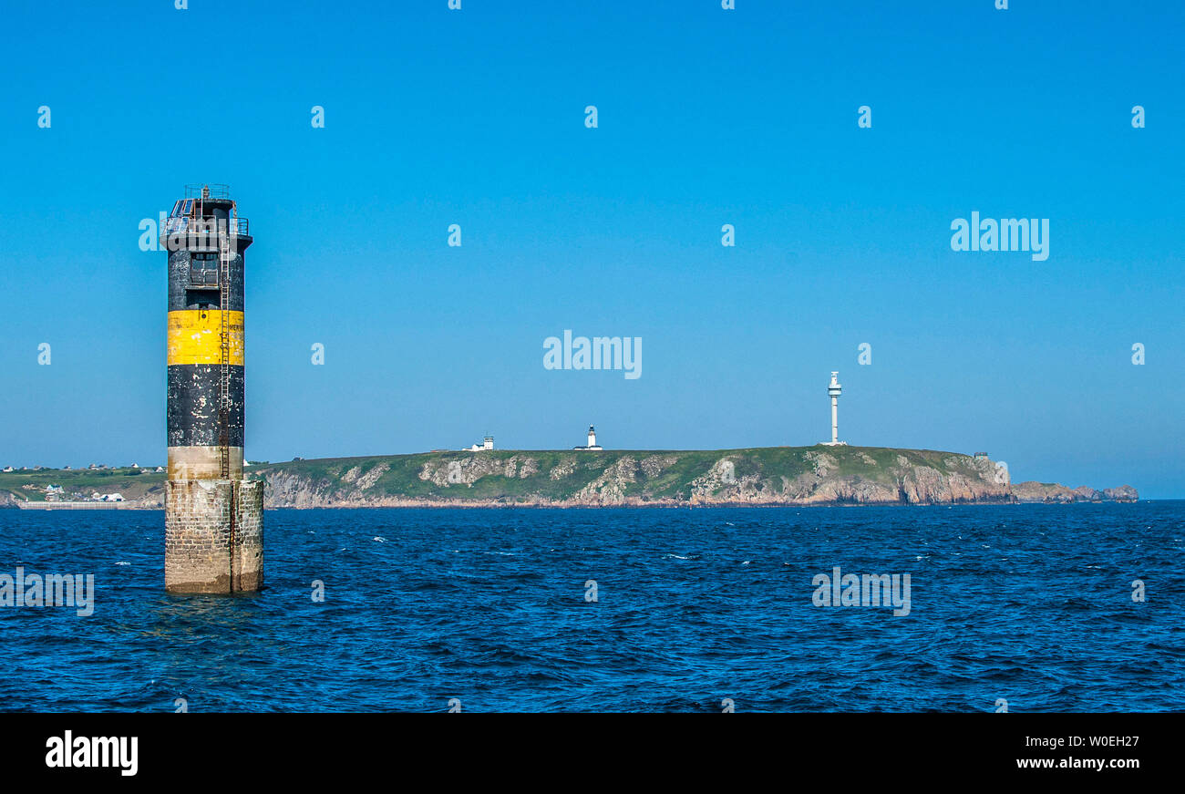 France, Brittany, Ile d'Ouessant, Pointe de Penn ar Lann, Men Korn beacon, Stiff lighthouse, radar tower of the CROSS (Regional Operational Centres for Monitoring and Rescue) and semaphore Stock Photo