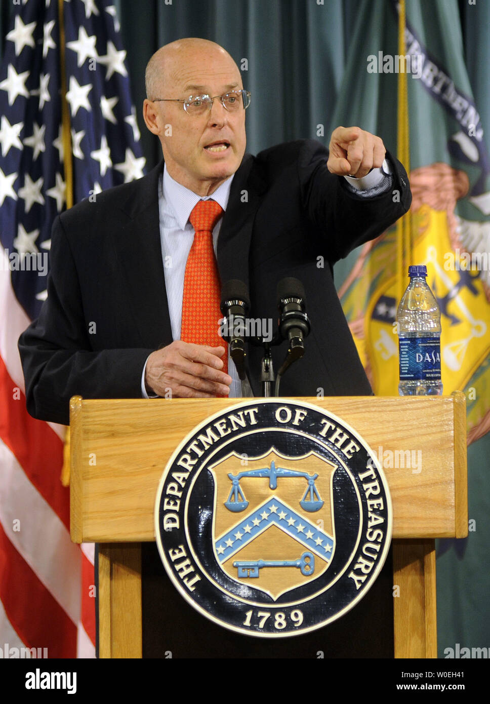 Treasury Secretary Henry Paulson delivers remarks on the economy and the financial rescue package at the Treasury Department in Washington on November 12, 2008. Paulson said the goal for plan would be to support financial markets which supply consumers credit, such as credit card debt, auto loans and student loans. (UPI Photo/Kevin Dietsch) Stock Photo