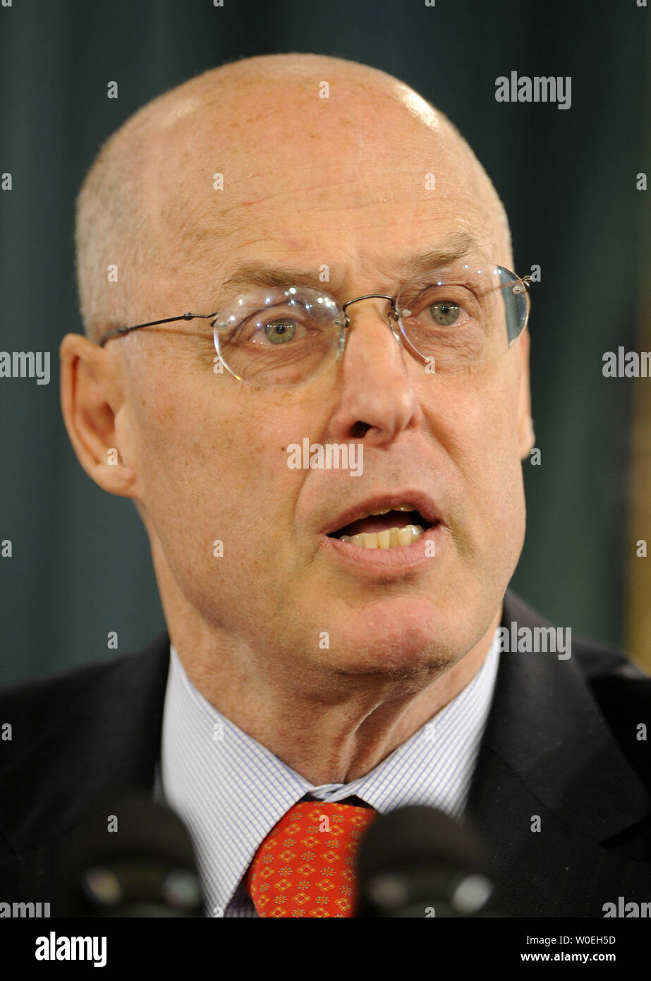 Treasury Secretary Henry Paulson delivers remarks on the economy and the financial rescue package at the Treasury Department in Washington on November 12, 2008. Paulson said the goal for plan would be to support financial markets which supply consumers credit, such as credit card debt, auto loans and student loans. (UPI Photo/Kevin Dietsch) Stock Photo