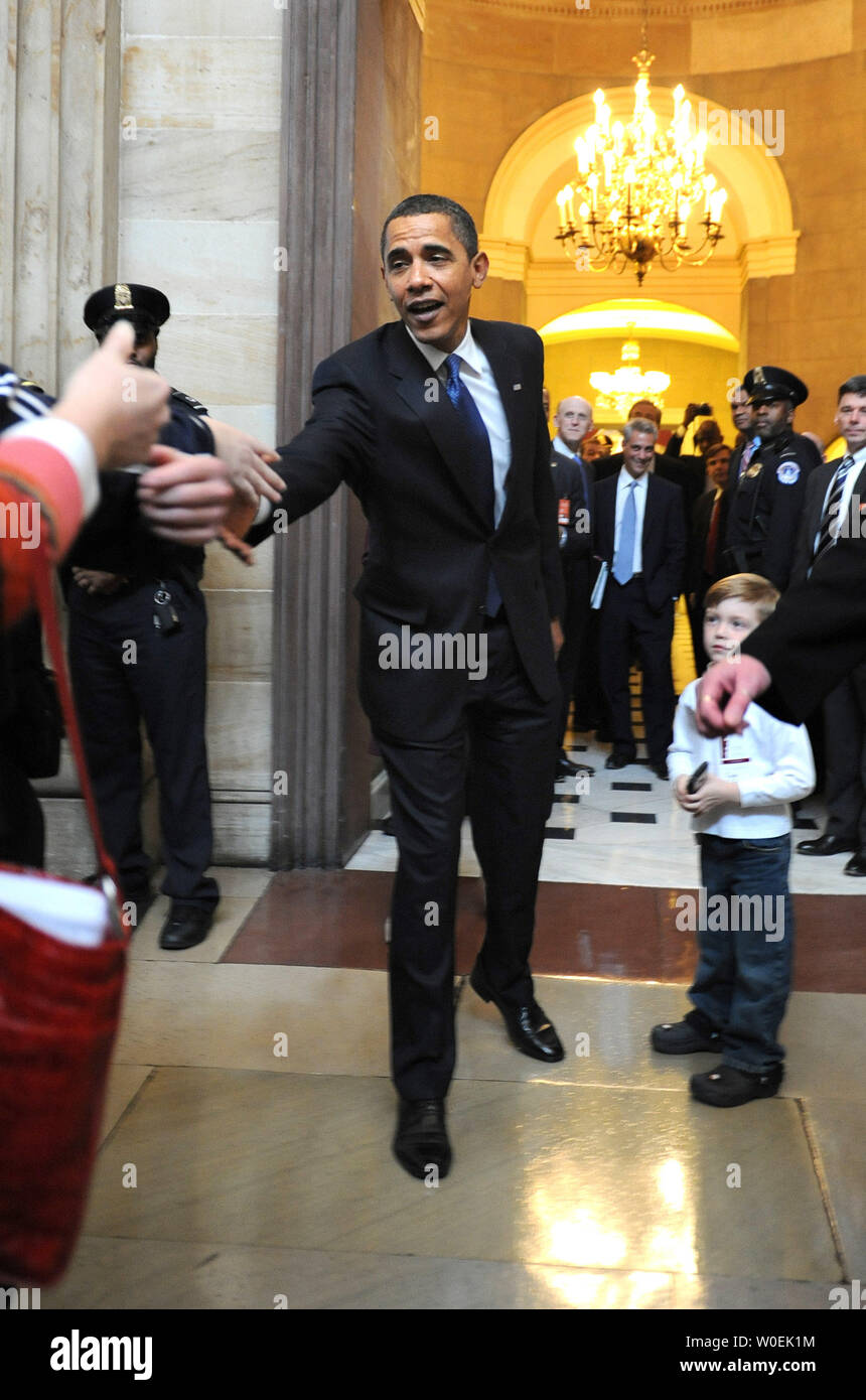 President-elect Barack Obama greets a visitor at the Capitol Building following a meeting with Speaker of the House Nancy Pelosi (D-CA) in Washington on January 5, 2008. (UPI Photo/Kevin Dietsch) Stock Photo