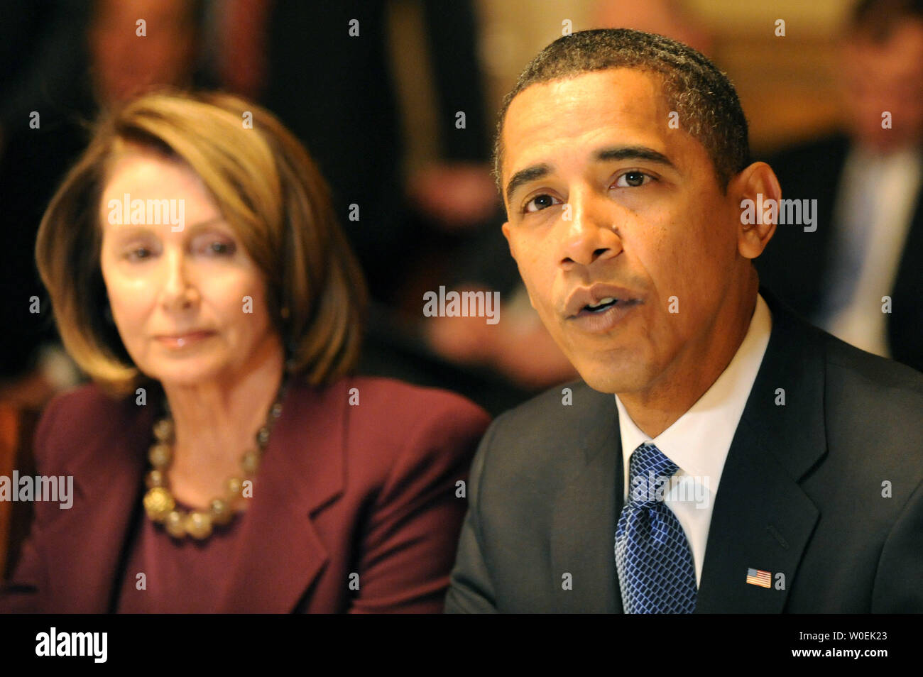 President-elect Barack Obama (R) delivers remarks alongside Speaker of the House Nancy Pelosi (D-CA) during a meeting with Congressional leaders on Capitol Hill in Washington on January 5, 2008. (UPI Photo/Kevin Dietsch) Stock Photo