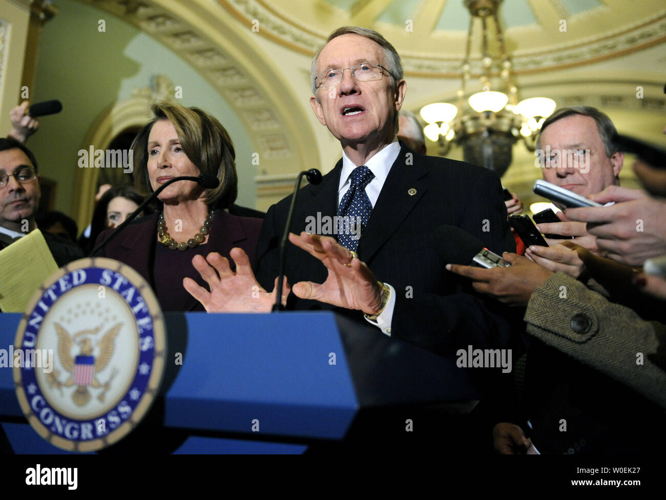 Senate Majority Leader Harry Reid (D-NV) and Speaker of the House Nancy Pelosi (D-CA) speak to the press following a meeting with President-elect Barack Obama on Capitol Hill in Washington on January 5, 2008. (UPI Photo/Kevin Dietsch) Stock Photo
