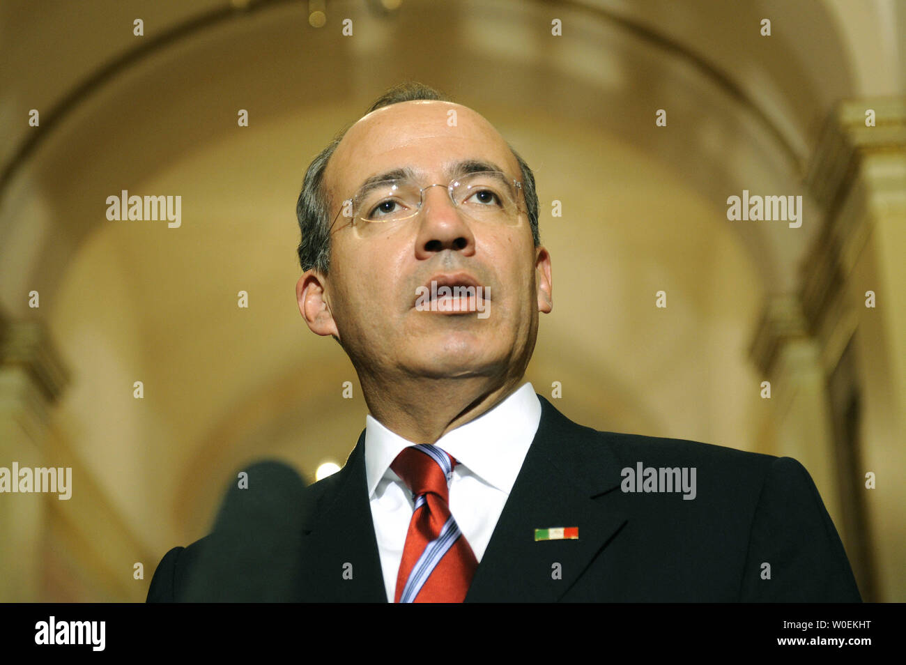 Mexican President Felipe Calderon address members of the media prior to a meeting with Speaker of the House Nancy Pelosi on Capitol Hill in Washington on January 12, 2008. (UPI Photo/Kevin Dietsch) Stock Photo
