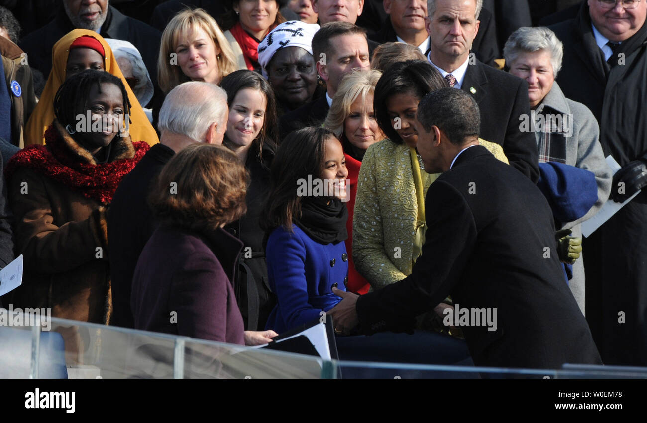 President Barack Obama is greeted by his daughter Malia after he delivered his Inaugural address after being sworn as the 44th President of the United States on the west steps of the Capitol on January 20, 2009.    (UPI Photo/Pat Benic) Stock Photo