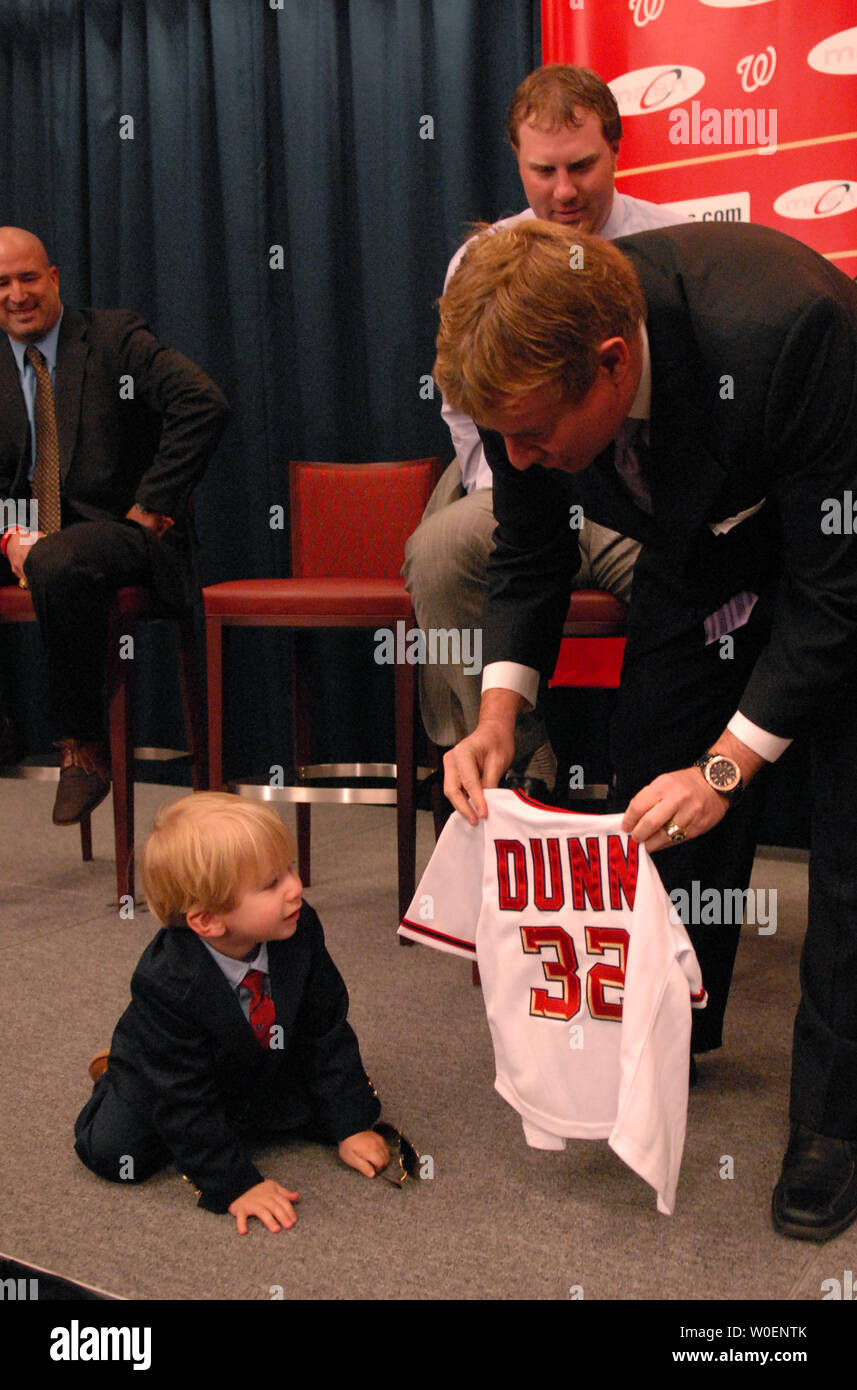 Washington Nationals General manager Jim Bowden holds a small