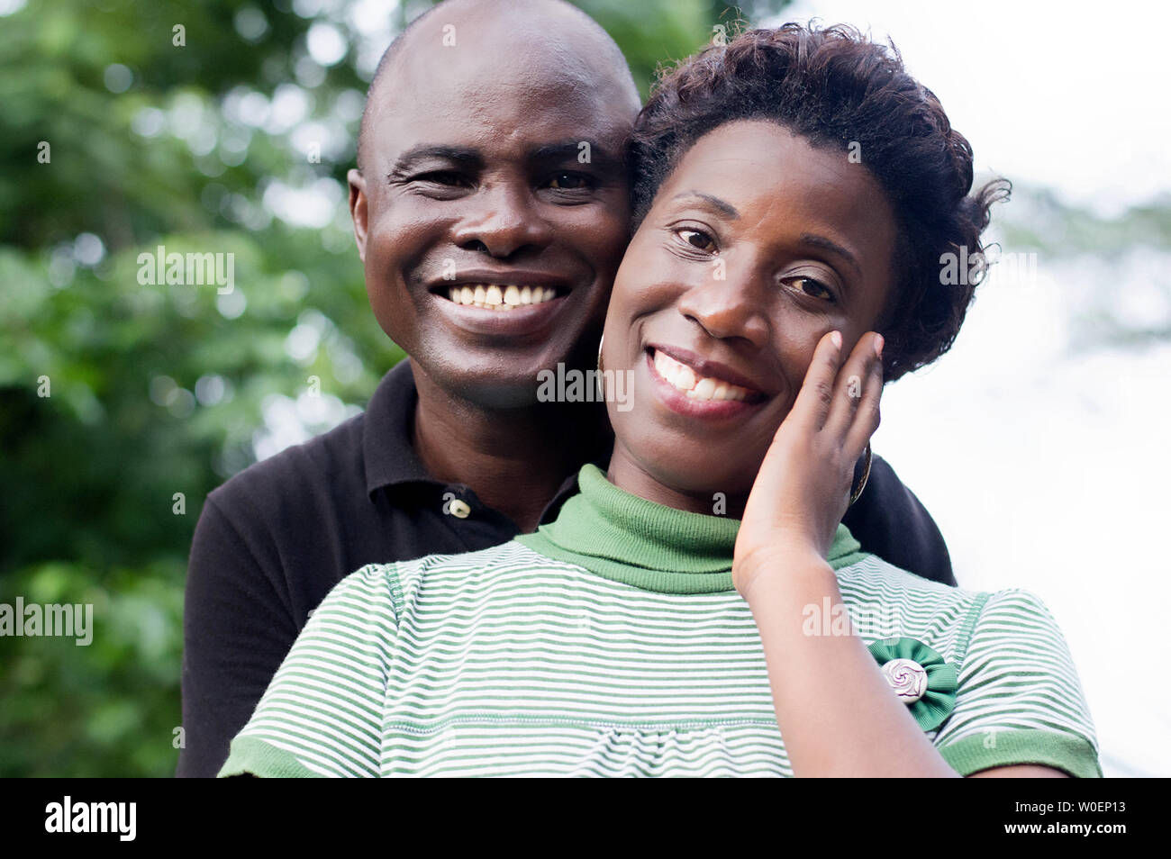 portrait of happy young couple in love in the countryside. Stock Photo